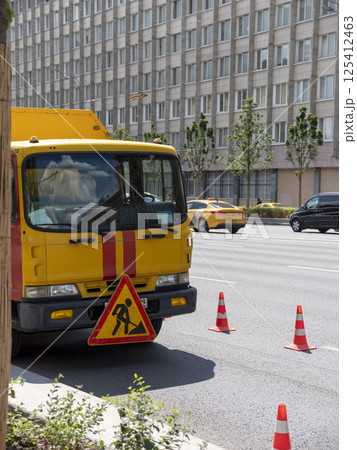 Moscow, Russia May 14, 2024: red yellow emergency truck on asphalt road 125412463