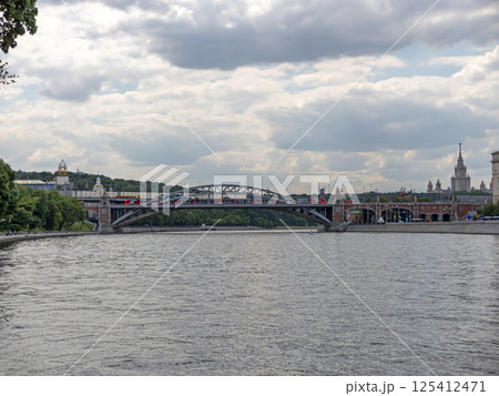Moscow, Russia May 14, 2024: View of the Moscow river embakment, Andreevsky bridge and cruise ships 125412471