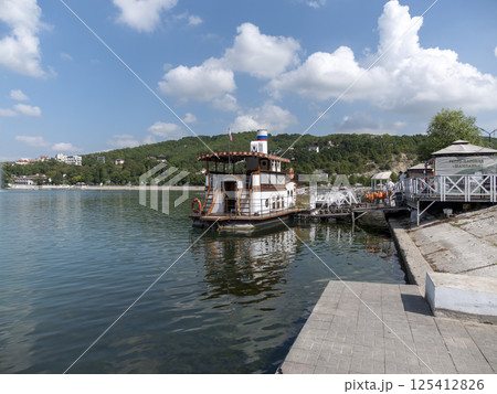 Abrau Durso, Russia 28 August 2024: The retro steamship Champagne is moored at the pier on the embankment of Lake Abrau-Durso 125412826