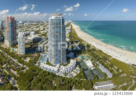 Miami Beach city with high luxury hotels and condos and sandy beachfront 125413000