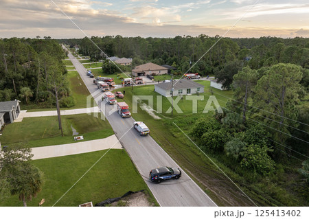 First responders investigating carbon monoxide gas hazard at residential home in Florida, USA 125413402