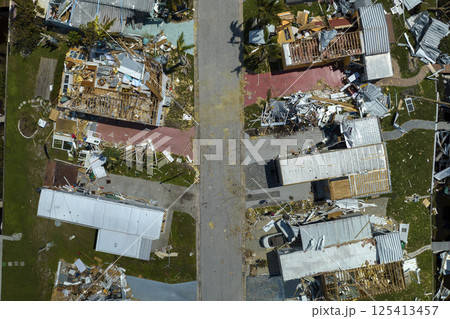 Destroyed by hurricane Ian suburban houses in Florida mobile home residential area. Consequences of natural disaster Destroyed by hurricane Ian suburban houses in Florida mobile home residential area. Consequences of natural disaster 125413457