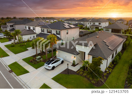 American gated community houses in rural US suburbs. View from above of large residential homes in small town in southwest Florida 125413705
