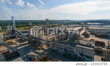 Aerial view of wood processing factory with stacks of lumber at plant manufacturing yard. 125413734