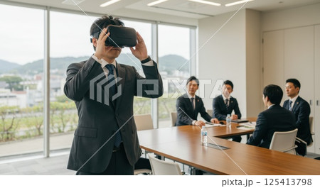 会議室でVRを使う日本人男性（ai生成画像） 125413798