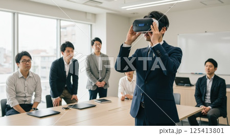 会議室でVRを使う日本人男性(ai生成画像) 会議室でVRを使う日本人男性(ai生成画像) 125413801