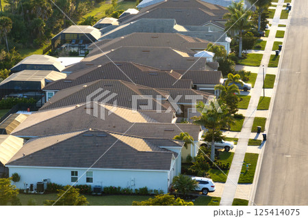 Aerial view of expensive residential houses in small town in southwest Florida. American dream homes as example of real estate development in US suburbs 125414075