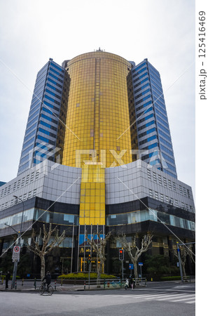 Shanghai, China - 1 April 2025: Modern Fangdi Building office tower at 201 Laoshan West Road, Pudong. Glass-and-steel high-rise with geometric architecture in Shanghai's bustling business district 125416469
