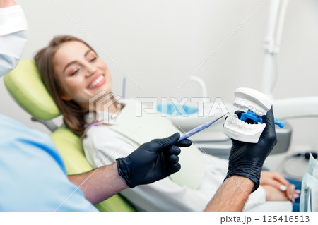 treating teeth, dental teeth model, dental tools, stomatological cabinet, dental check-up, dentistry professional, dental care 125416513