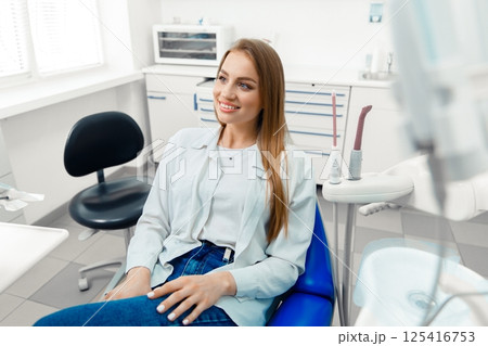 smiling dentist patient, healthy smile, visit dentist, dentist concept, dentistry clinic, beautiful woman smiling at the camera 125416753