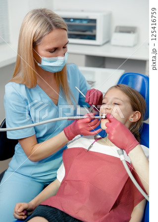 checking teeth, child dentist patient, Professional stomatology kid, professional doctor fixing teeth, dental specialist 125416759