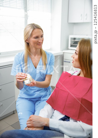 dental consultation, dentist checking teeth, dental examination, healthy teeth, dentist office, professional orthodontic clinic dental consultation, dentist checking teeth, dental examination, healthy teeth, dentist office, professional orthodontic clinic 125416813