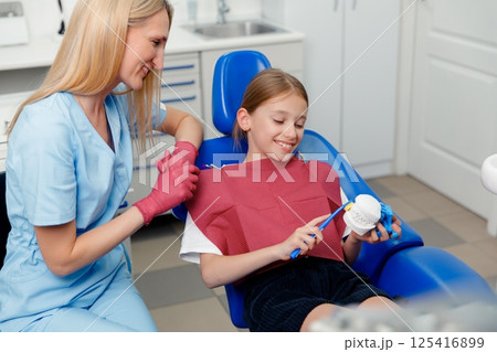 Children's dentistry, Smiling dentist, pediatric dentist, healthy smile, Child visit dentist, stomatological cabinet, dental clinic 125416899