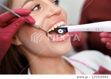 dentist concept, dental explorer, Stomatology cabinet, dental tools, examination patient, dental procedure, professional orthodontic clinic 125416944