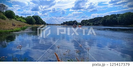 Serene River Landscape with Reflections Serene River Landscape with Reflections 125417379