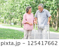 Happy senior couple walking in the park 125417662