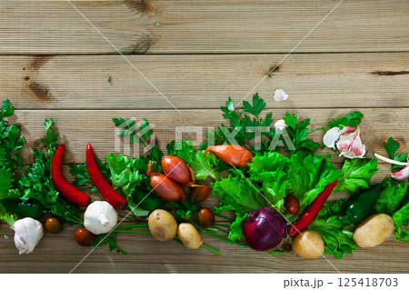 Fresh vegetables on wooden background 125418703