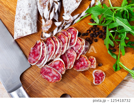 Sliced spanish sausage fuet Sliced spanish sausage fuet 125418732
