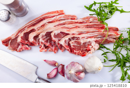 Chops of fresh raw lamb ribs Chops of fresh raw lamb ribs 125418810