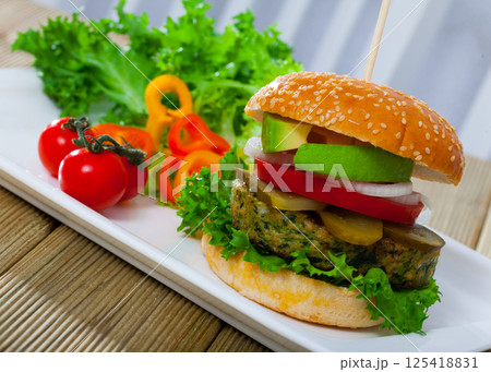 Vegan burger with greens 125418831
