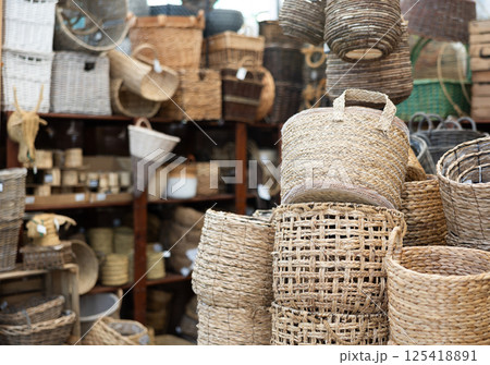 Many different wicker baskets made of natural material at market Many different wicker baskets made of natural material at market 125418891