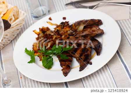 Pork liver fried with onion Pork liver fried with onion 125418924
