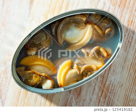 Canned mollusks in oil 125419182