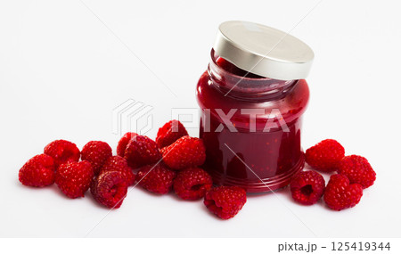Raspberry jam and fresh raspberries 125419344
