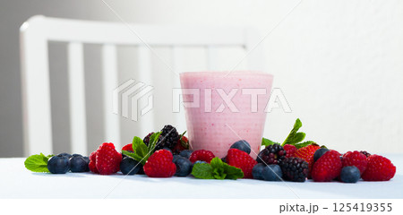 Smoothie with milk and berries 125419355