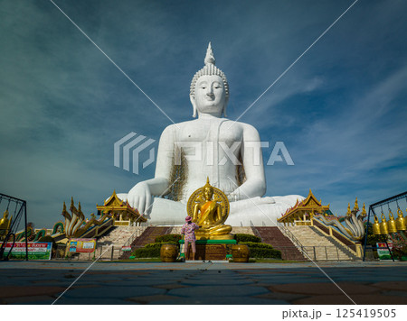 April 12, 2025, Impressive white Buddha statue at Wat Muang in Ang Thong, Thailand, observed under a clear sky during pleasant weather April 12, 2025, Impressive white Buddha statue at Wat Muang in Ang Thong, Thailand, observed under a clear sky during pleasant weather 125419505