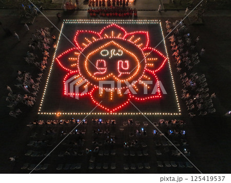 Lopburi, Thailand, April 12, 2025, Colorful light display for the Lopburi Puttha Sathan festival, celebrating spiritual traditions 125419537