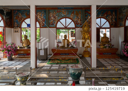Nonthaburi, Thailand, March 15, 2025, Buddhist altar with golden and seated figures in Wat Chomphuwek Nonthaburi, Thailand, March 15, 2025, Buddhist altar with golden and seated figures in Wat Chomphuwek 125419719