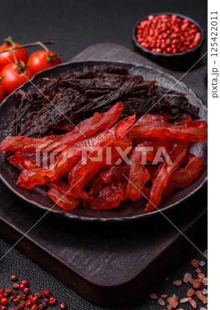 Jerky, dried chicken slices with salt and spices 125422011