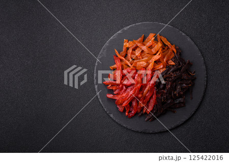 Jerky, dried chicken slices with salt and spices Jerky, dried chicken slices with salt and spices 125422016