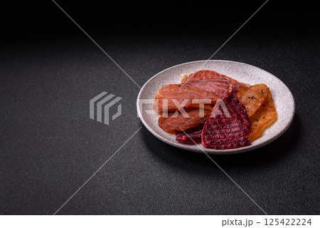Jerky, dried pork meat with salt and spices Jerky, dried pork meat with salt and spices 125422224
