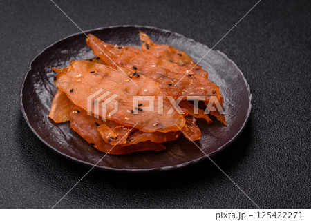Jerky, dried chicken meat with salt and spices 125422271
