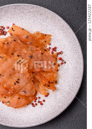 Jerky, dried chicken meat with salt and spices Jerky, dried chicken meat with salt and spices 125422287