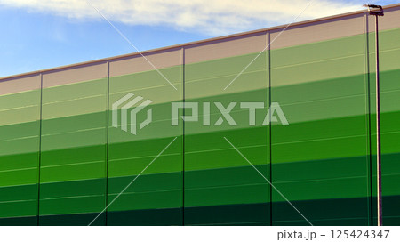 Facade of an industrial building and warehouse. 125424347