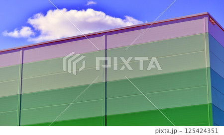 Facade of an industrial building and warehouse. 125424351