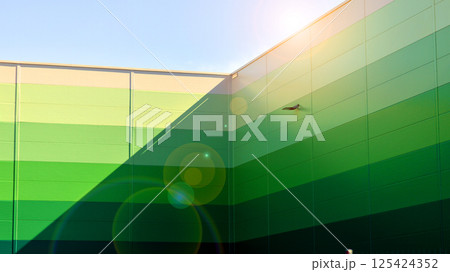 Facade of an industrial building and warehouse. Facade of an industrial building and warehouse. 125424352