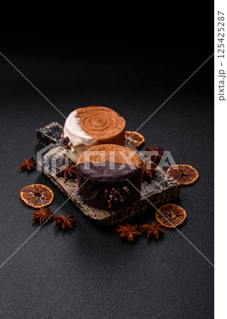 Round sweet New York roll croissant with chocolate cream filling Round sweet New York roll croissant with chocolate cream filling 125425287