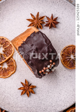 Round sweet New York roll croissant with chocolate cream filling Round sweet New York roll croissant with chocolate cream filling 125425389