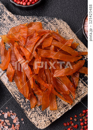 Jerky, dried turkey meat with salt and spices Jerky, dried turkey meat with salt and spices 125425488
