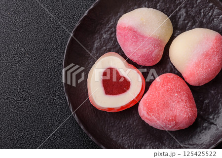 Delicious sweet mochi in the shape of red hearts Delicious sweet mochi in the shape of red hearts 125425522
