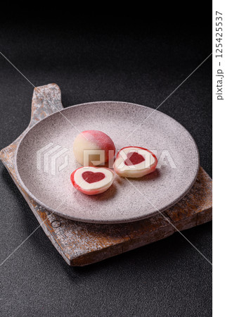 Delicious sweet mochi in the shape of red hearts Delicious sweet mochi in the shape of red hearts 125425537