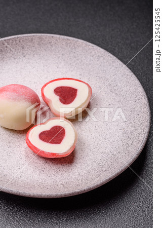 Delicious sweet mochi in the shape of red hearts 125425545