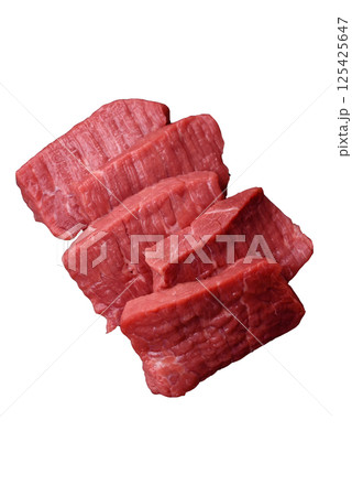 Raw beef tenderloin cut into slices with salt and spices 125425647