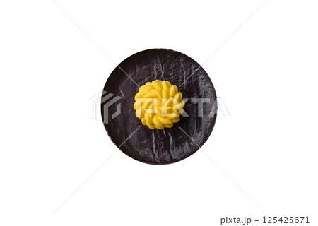 Round sweet tart of yellow color with citrus and passion fruit flavor Round sweet tart of yellow color with citrus and passion fruit flavor 125425671