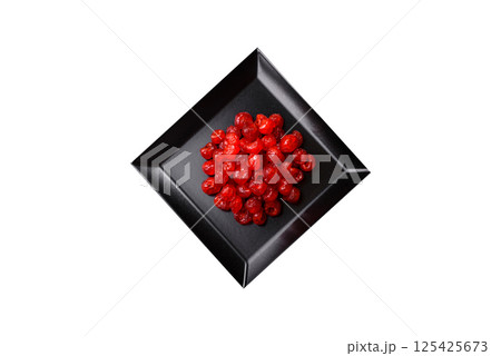 Dried sweet red pitted cherries or candied fruits 125425673