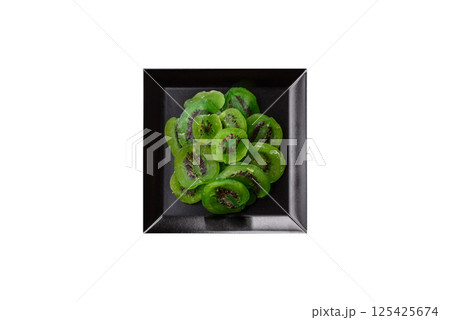 Dried sweet green kiwi or candied fruit 125425674